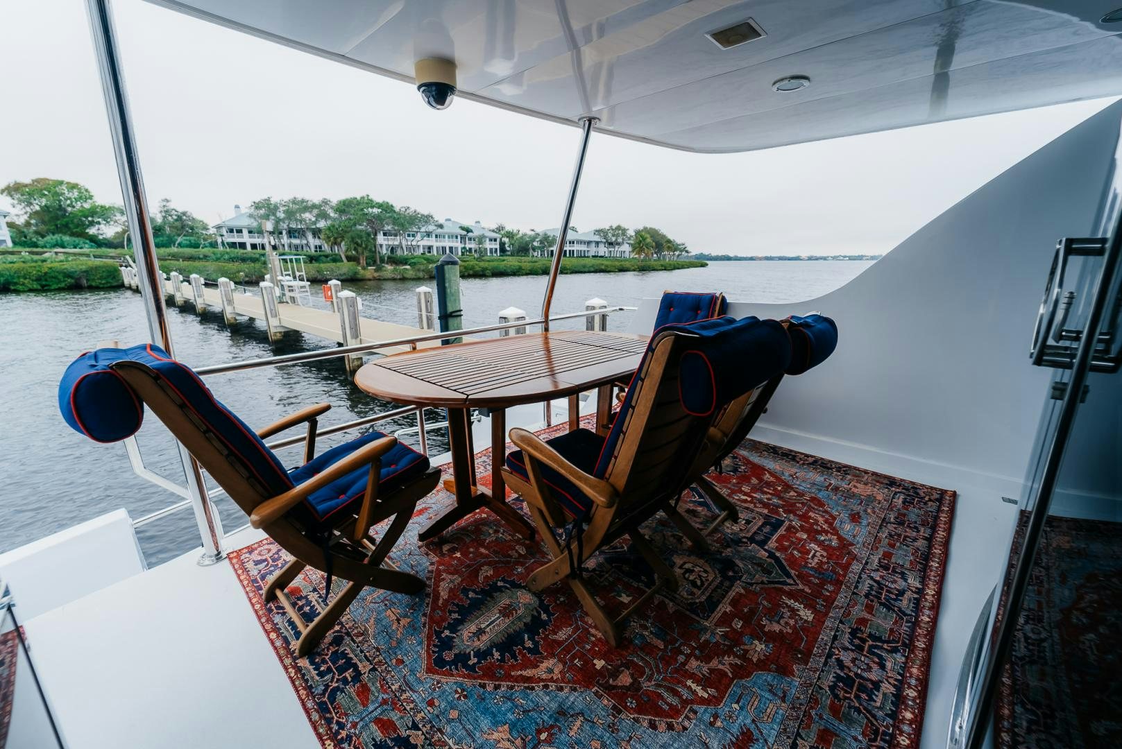 a table and chairs on a boat aboard Haggis XV Yacht for Sale