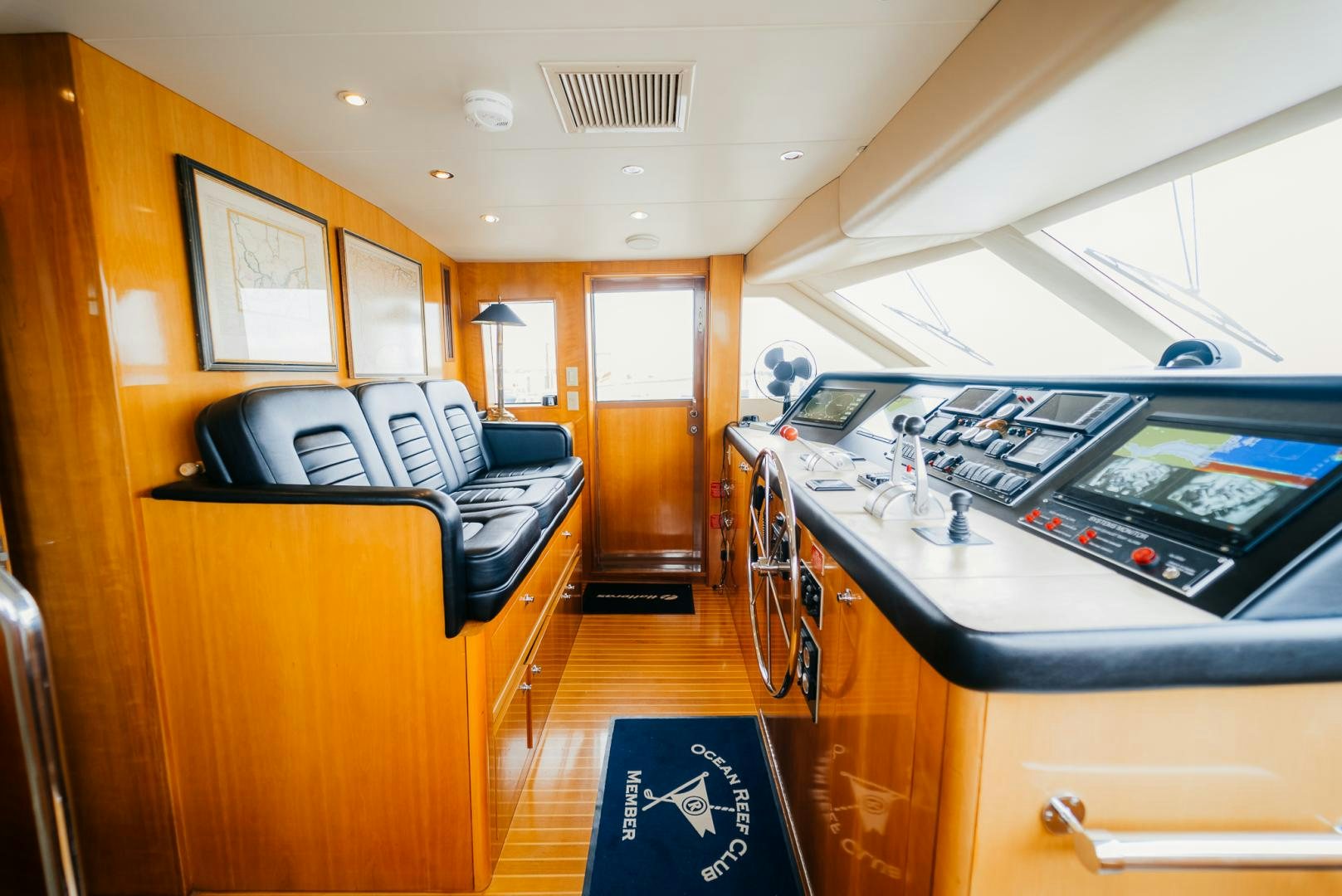 a room with a desk and a bed aboard Haggis XV Yacht for Sale