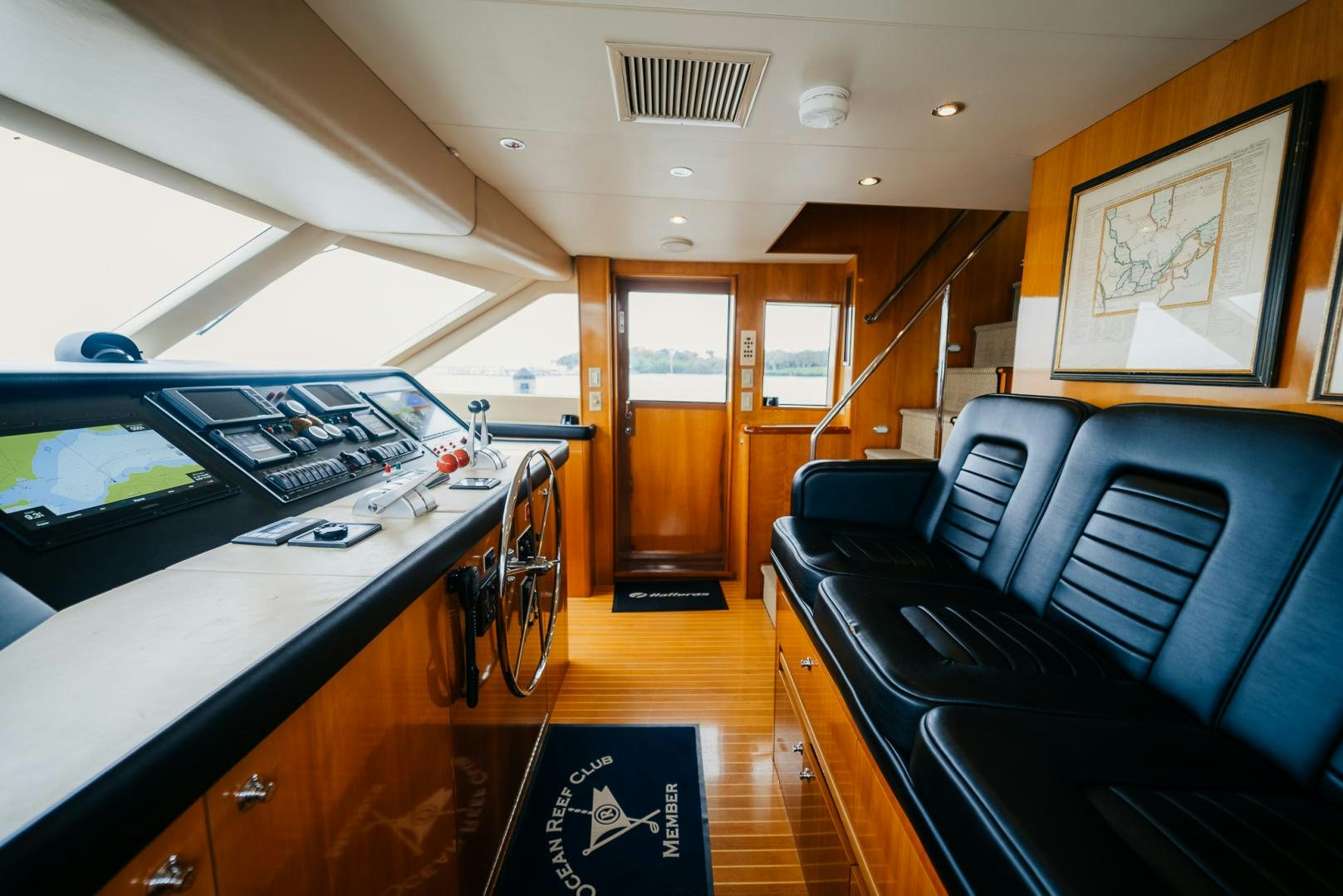 a room with a bed and a desk aboard Haggis XV Yacht for Sale