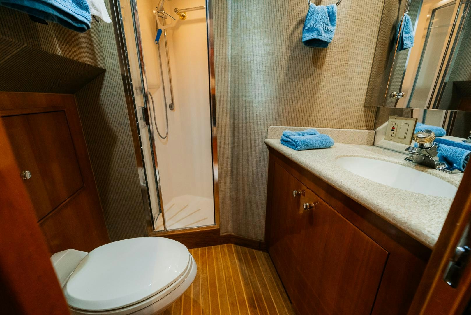 a bathroom with a sink and a toilet aboard Haggis XV Yacht for Sale
