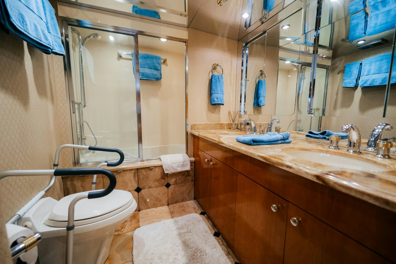 a bathroom with a sink and a shower aboard Haggis XV Yacht for Sale