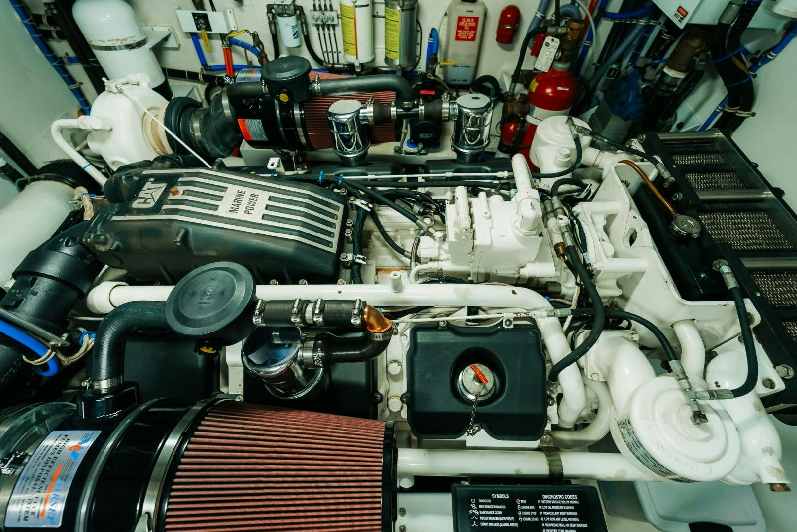 a car engine with its hood open aboard Haggis XV Yacht for Sale