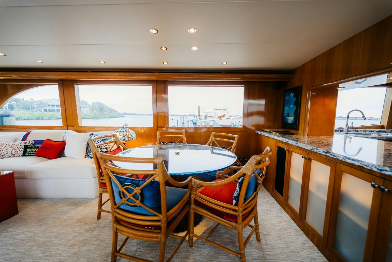 a kitchen with a dining table aboard Haggis XV Yacht for Sale