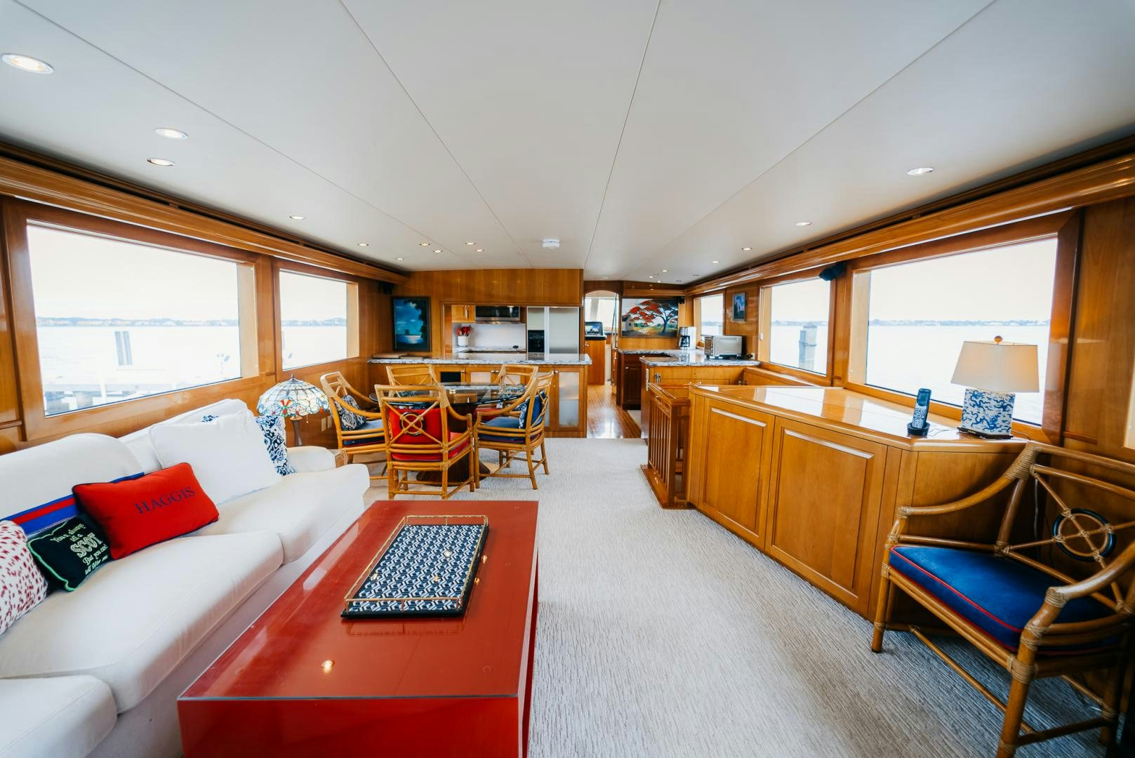 a living room with a table and chairs aboard Haggis XV Yacht for Sale