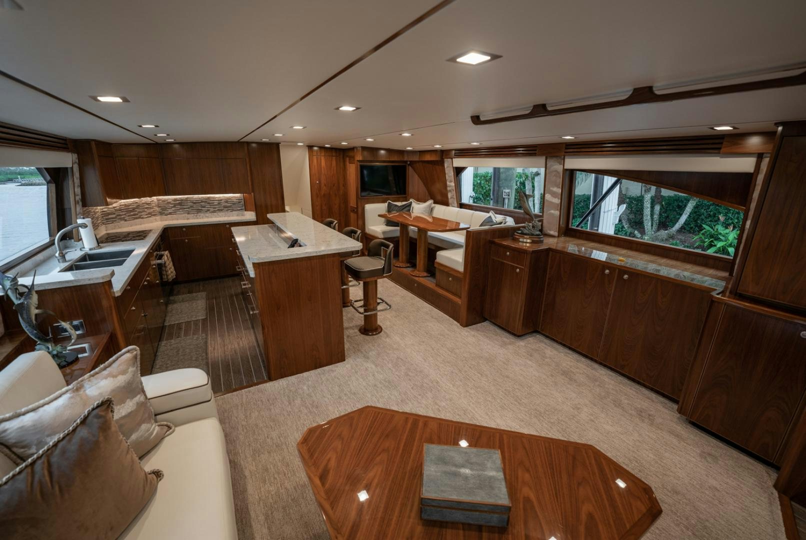 a room with a table and chairs aboard WHY WOULDN'T WE Yacht for Sale