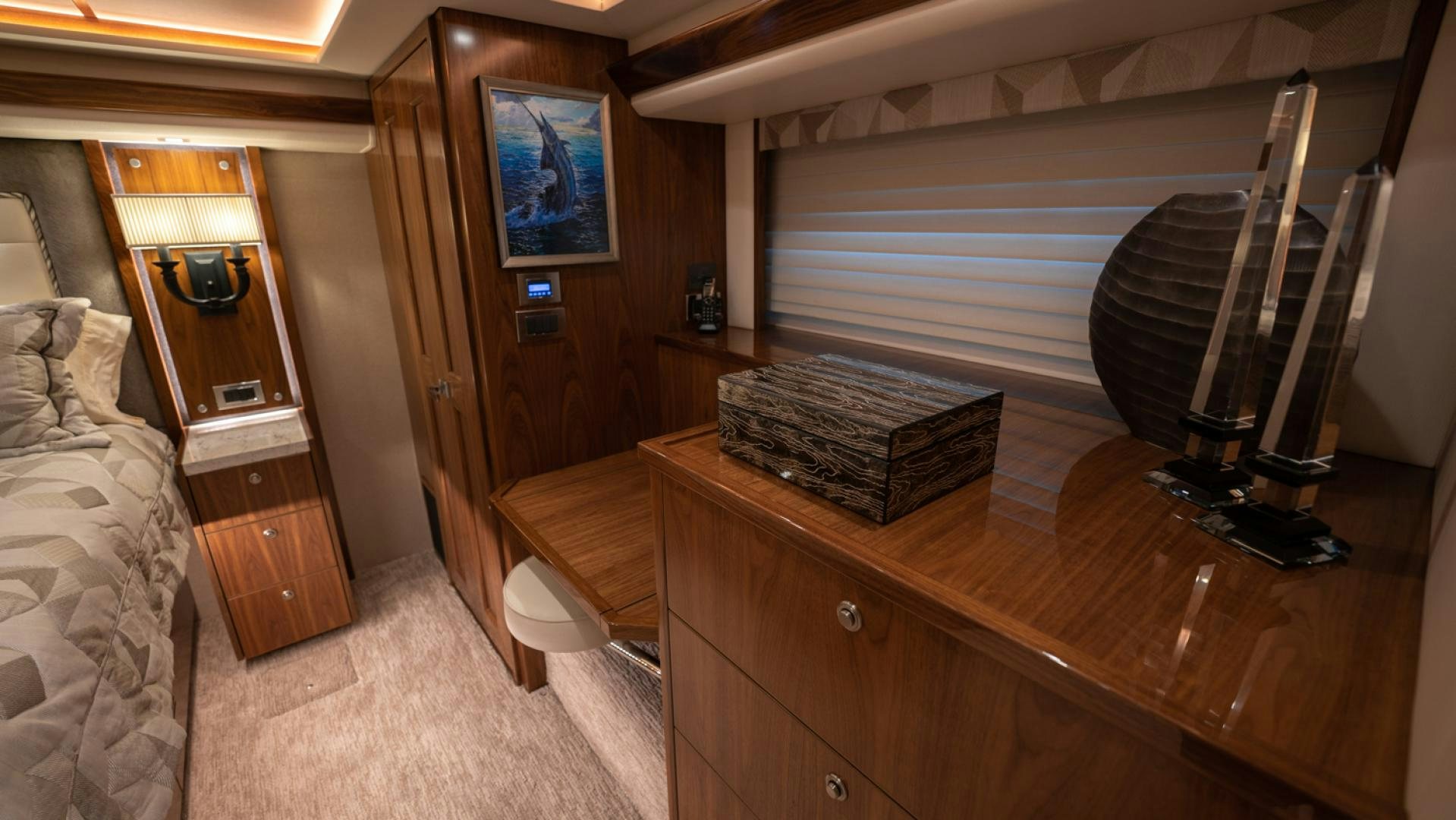a room with a wood desk and a large fan aboard WHY WOULDN'T WE Yacht for Sale