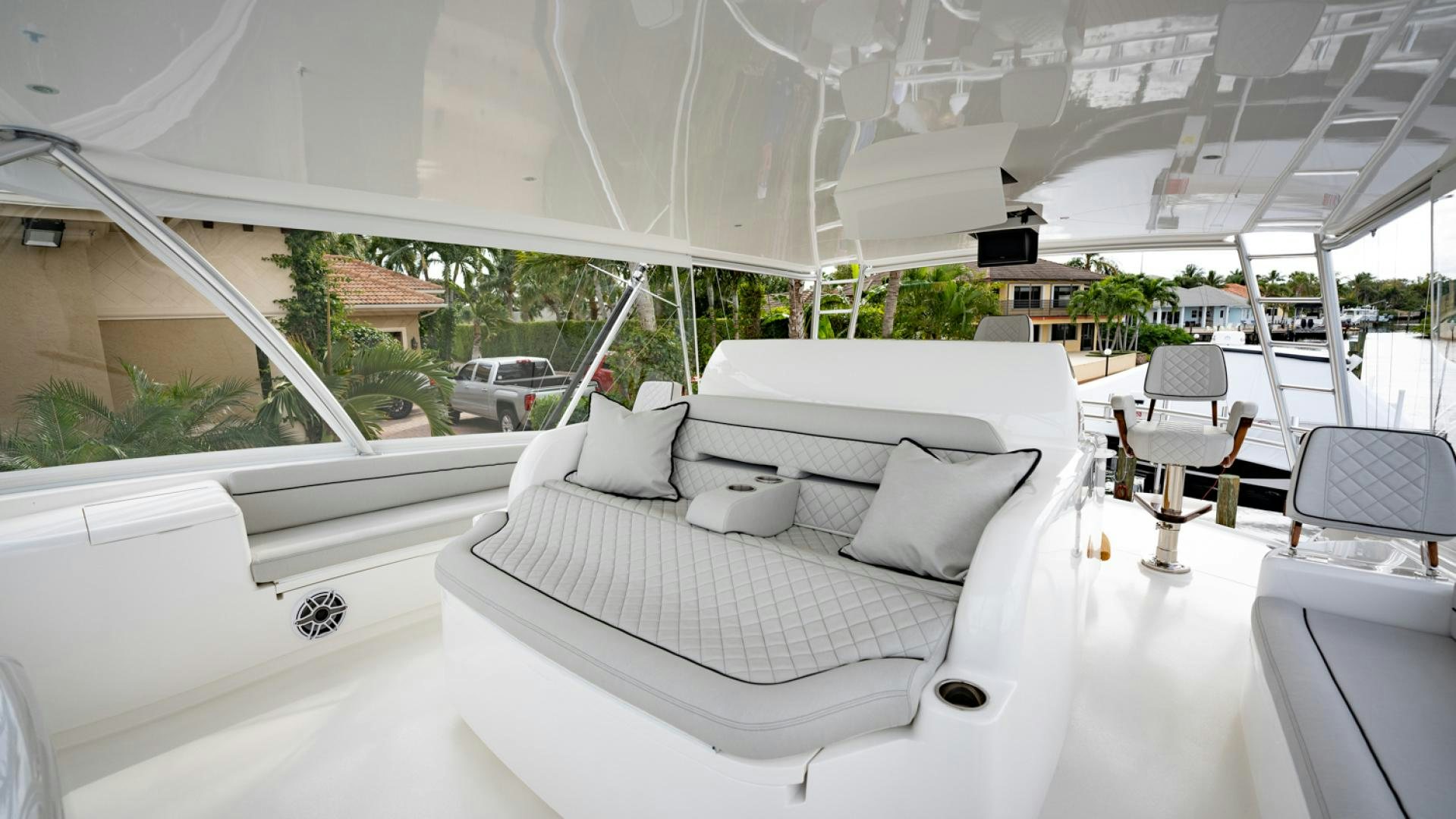 a white couch in a room aboard WHY WOULDN'T WE Yacht for Sale