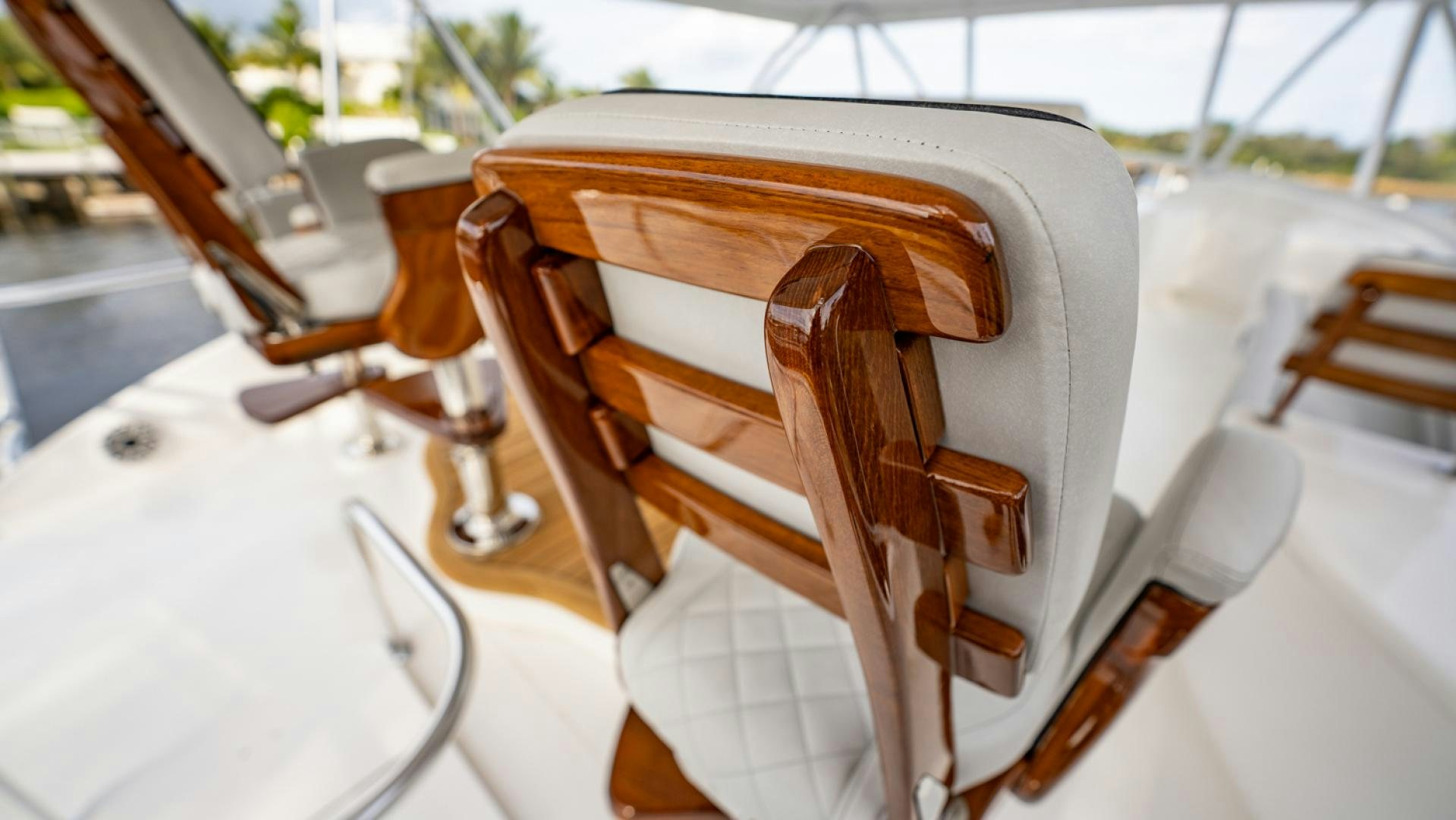 a brown leather chair on a white surface aboard WHY WOULDN'T WE Yacht for Sale