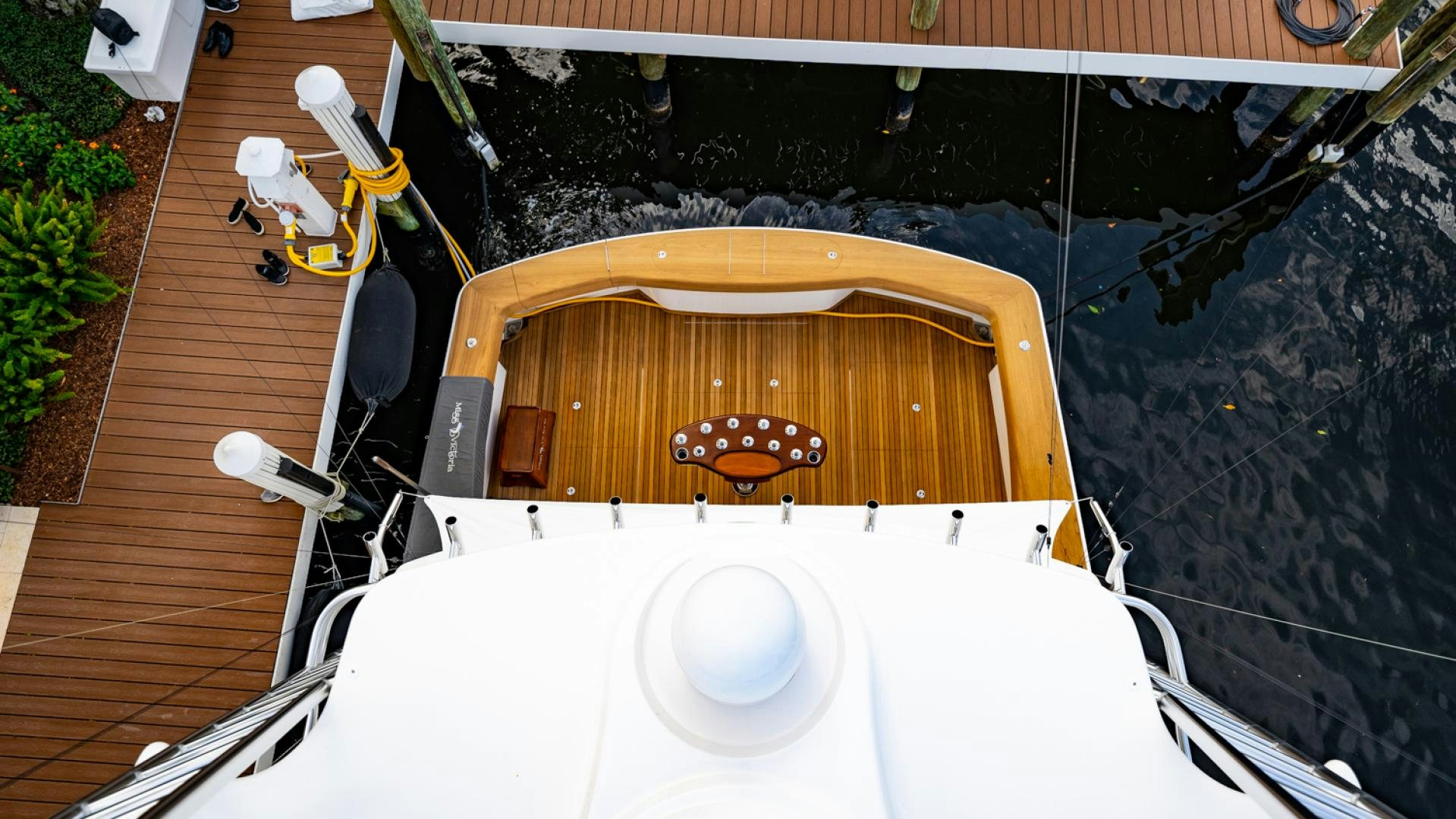a wooden building with a round wooden structure on top aboard WHY WOULDN'T WE Yacht for Sale