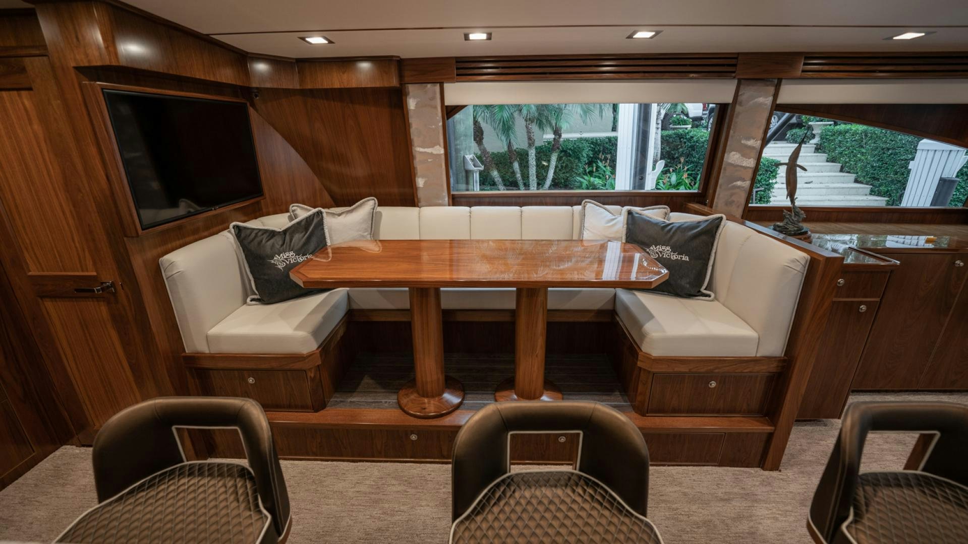 a living room with a couch and a table aboard WHY WOULDN'T WE Yacht for Sale