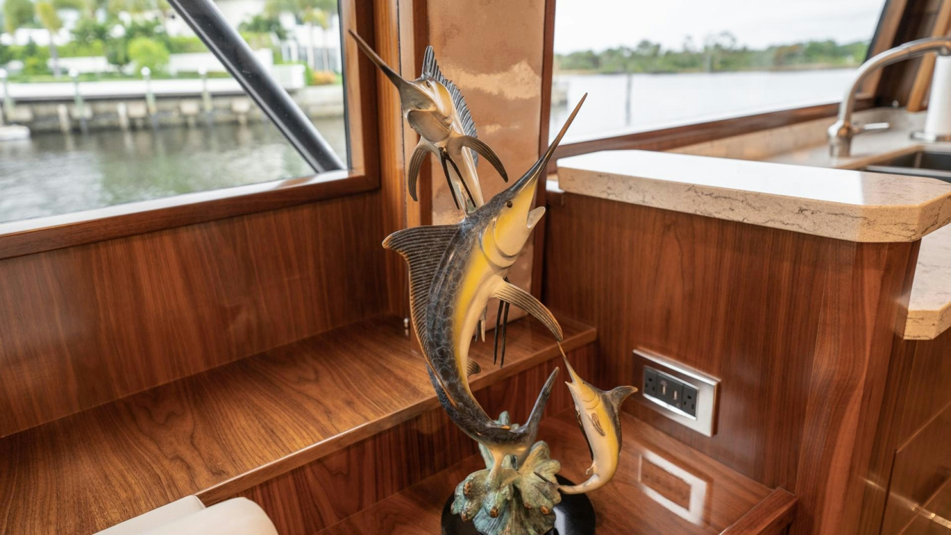 a couple of birds on a window sill aboard WHY WOULDN'T WE Yacht for Sale