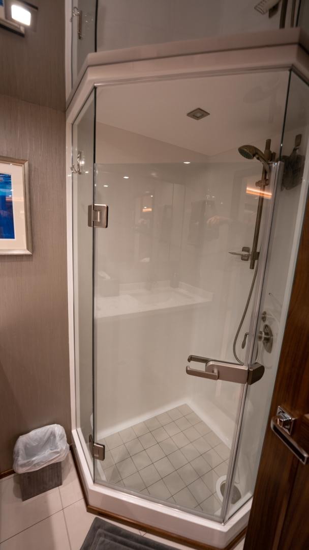 a shower with a glass door aboard WHY WOULDN'T WE Yacht for Sale