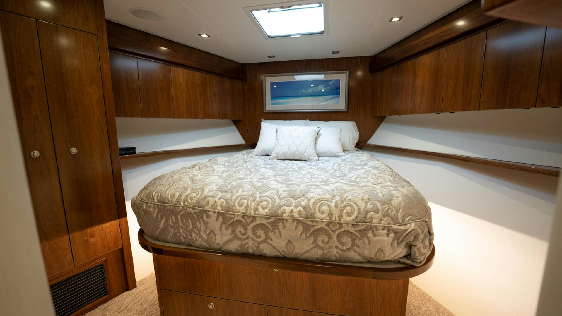 a room with a bed and a television aboard WHY WOULDN'T WE Yacht for Sale