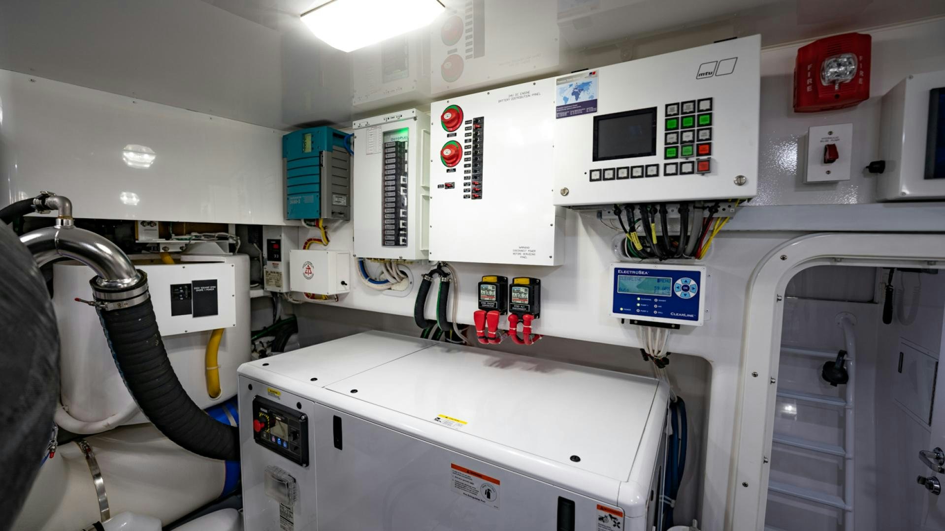 a room with machines and equipment aboard WHY WOULDN'T WE Yacht for Sale