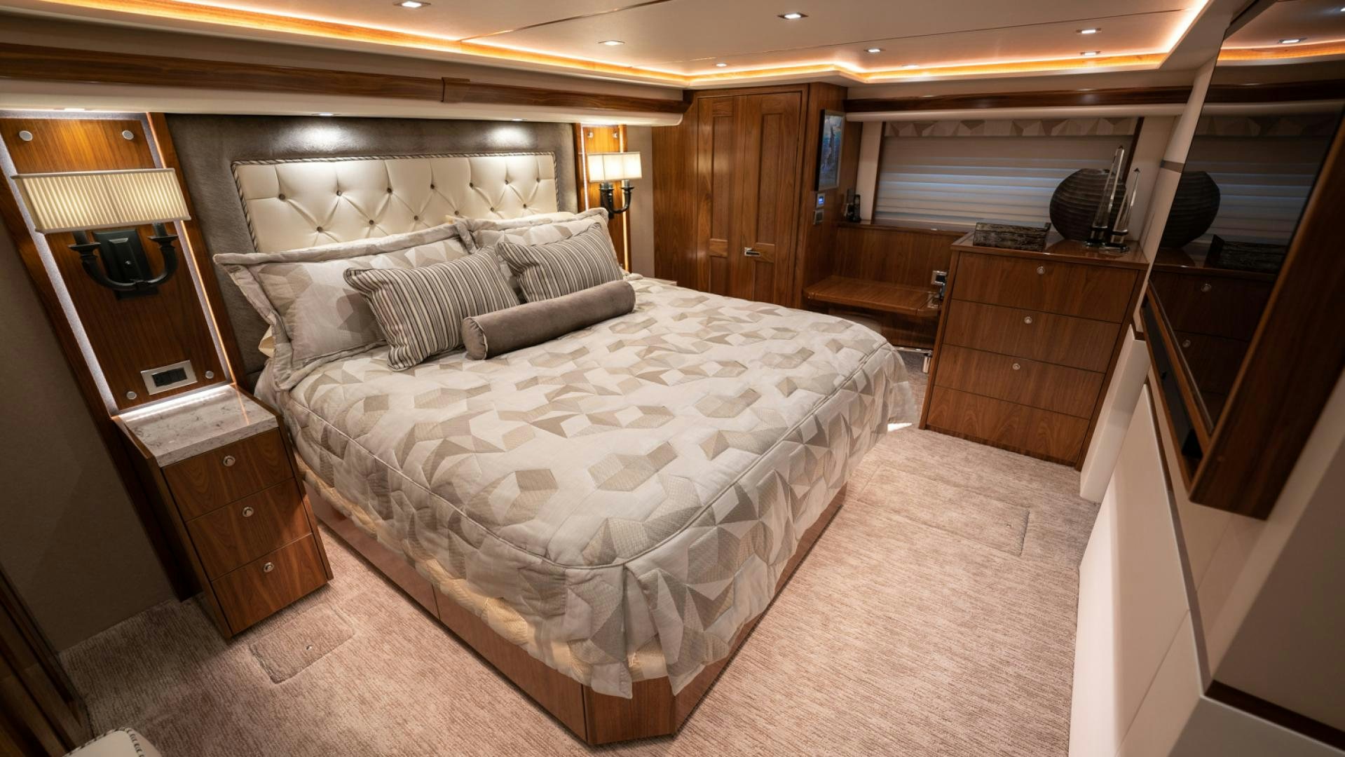 a large bedroom with a large bed aboard WHY WOULDN'T WE Yacht for Sale