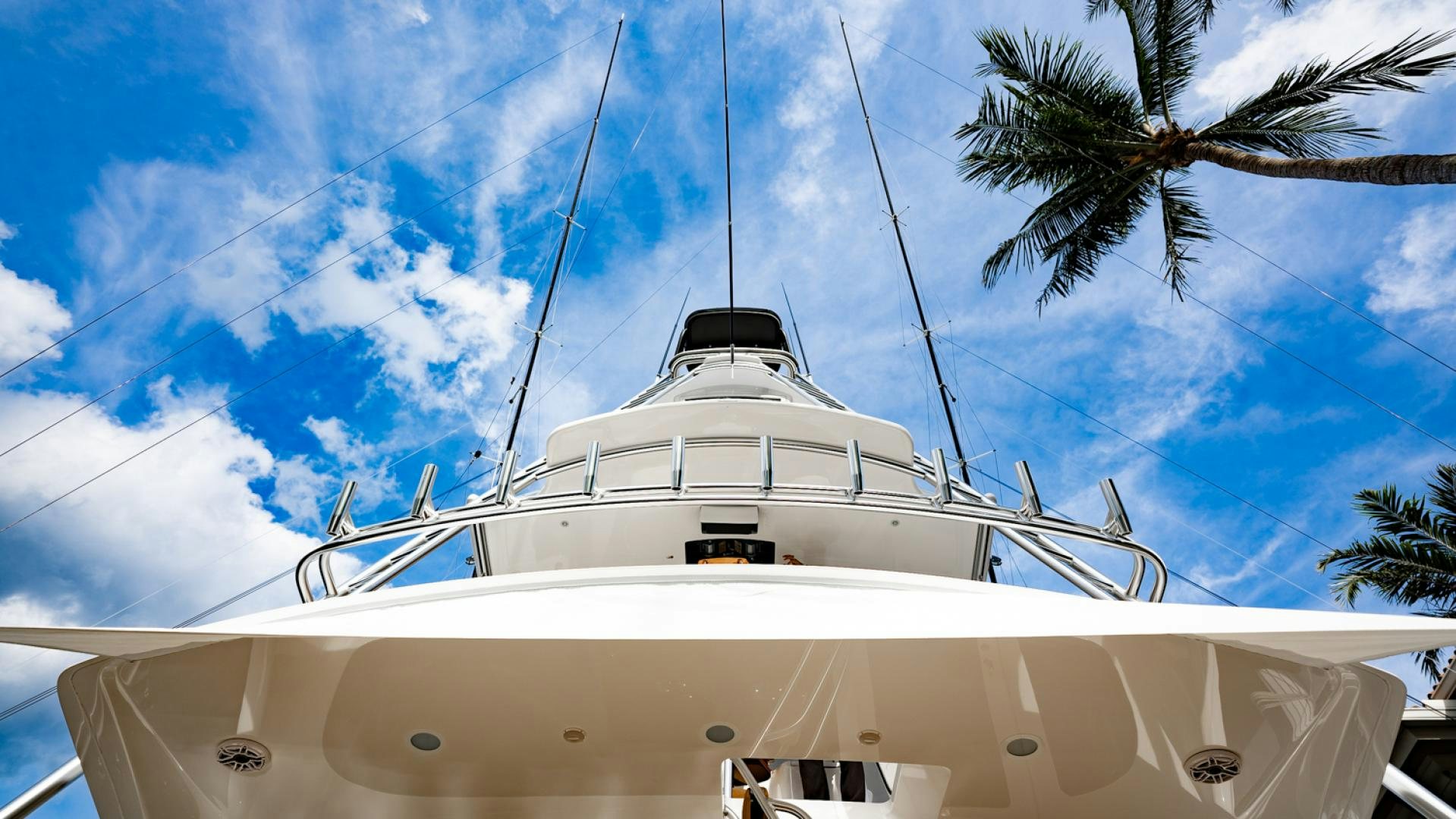 a white boat on a sunny day aboard WHY WOULDN'T WE Yacht for Sale