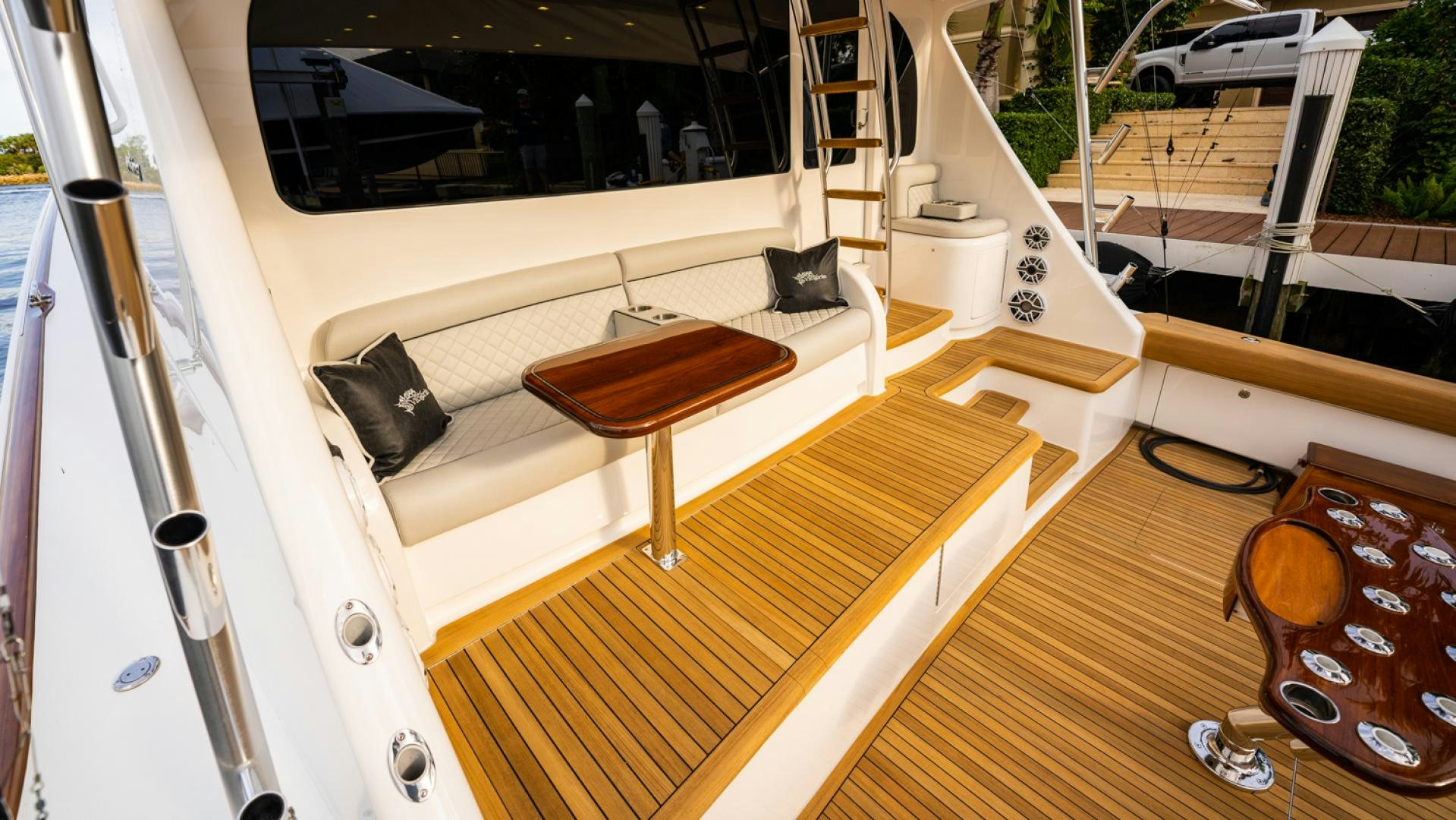 a room with a bed and a table aboard WHY WOULDN'T WE Yacht for Sale