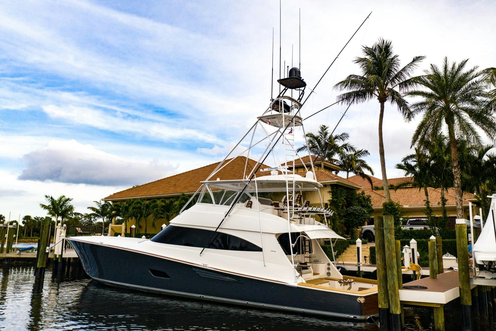 a boat docked at a pier aboard WHY WOULDN'T WE Yacht for Sale