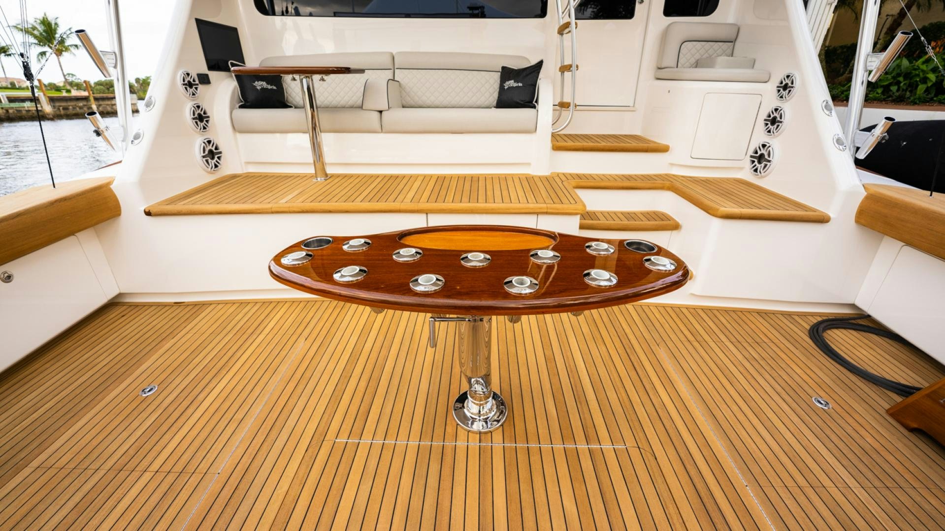 a wood table with a wood board aboard WHY WOULDN'T WE Yacht for Sale