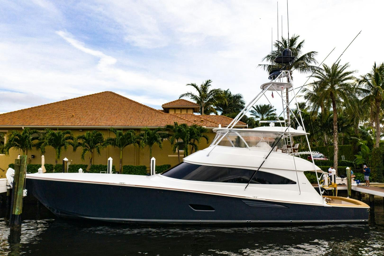 a boat docked at a pier aboard WHY WOULDN'T WE Yacht for Sale
