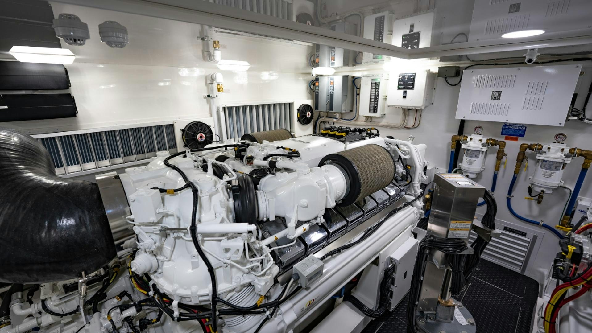 a room with machinery aboard WHY WOULDN'T WE Yacht for Sale