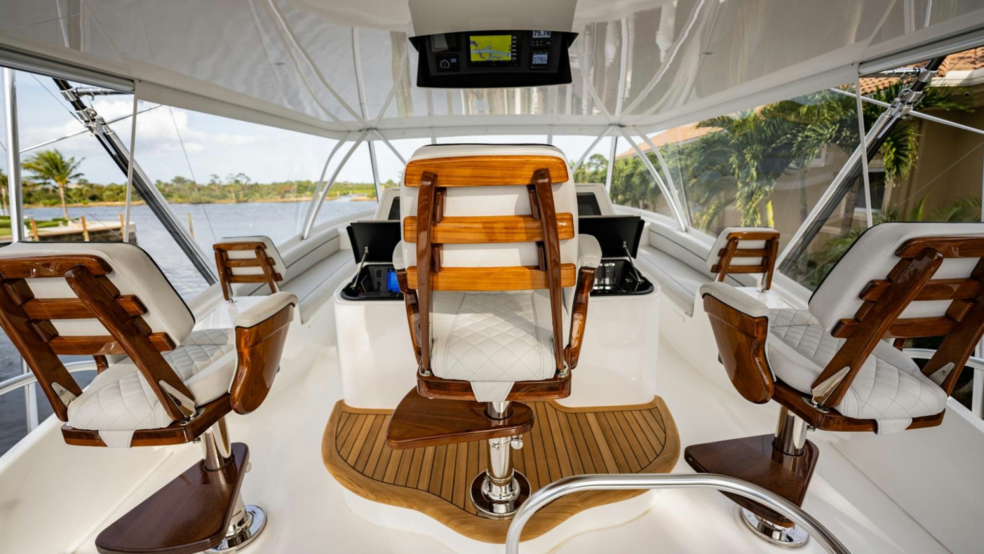 a room with chairs and tables aboard WHY WOULDN'T WE Yacht for Sale
