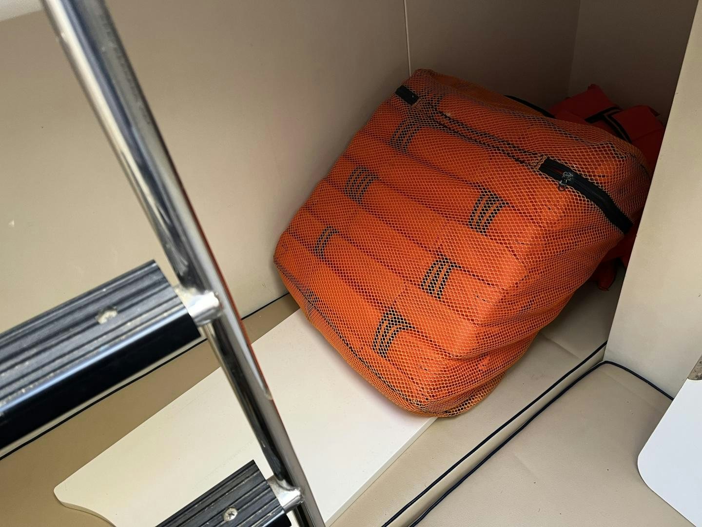 a bag on a shelf aboard SELAH WAY Yacht for Sale