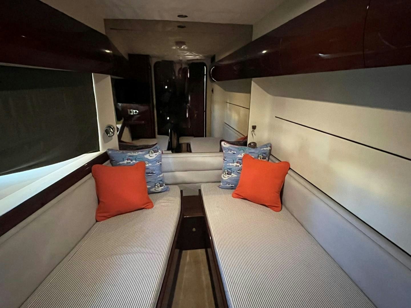a bed with pillows on it aboard SELAH WAY Yacht for Sale