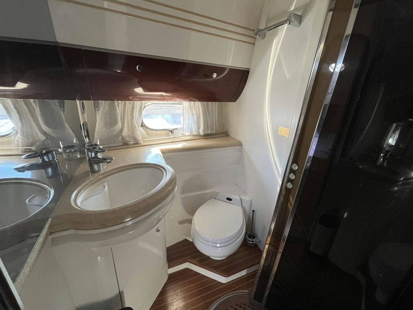 a bathroom with a sink and toilet aboard SELAH WAY Yacht for Sale