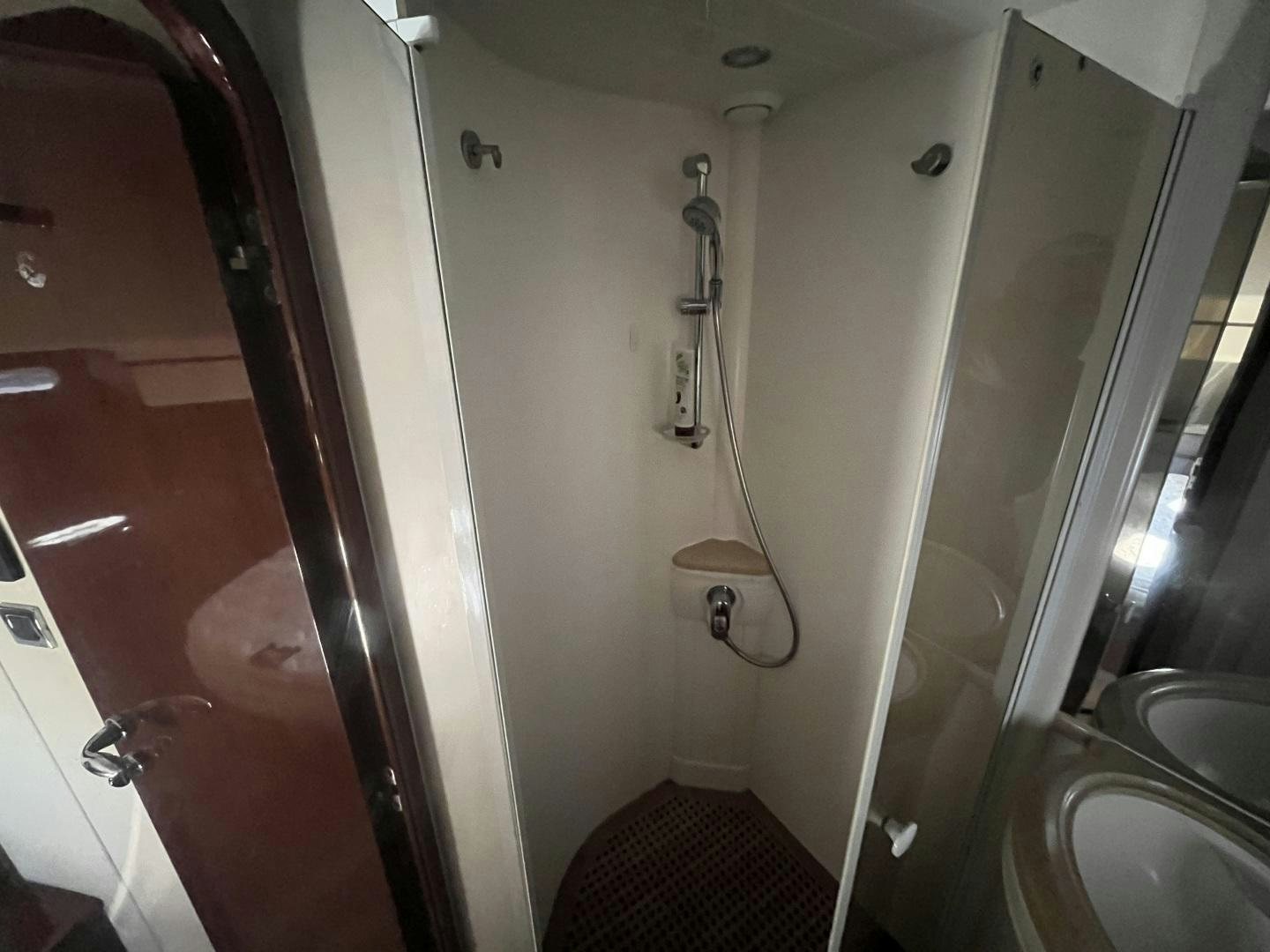 a bathroom with a shower and a sink aboard SELAH WAY Yacht for Sale