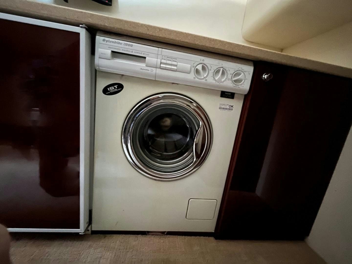 a washing machine and a washer aboard SELAH WAY Yacht for Sale