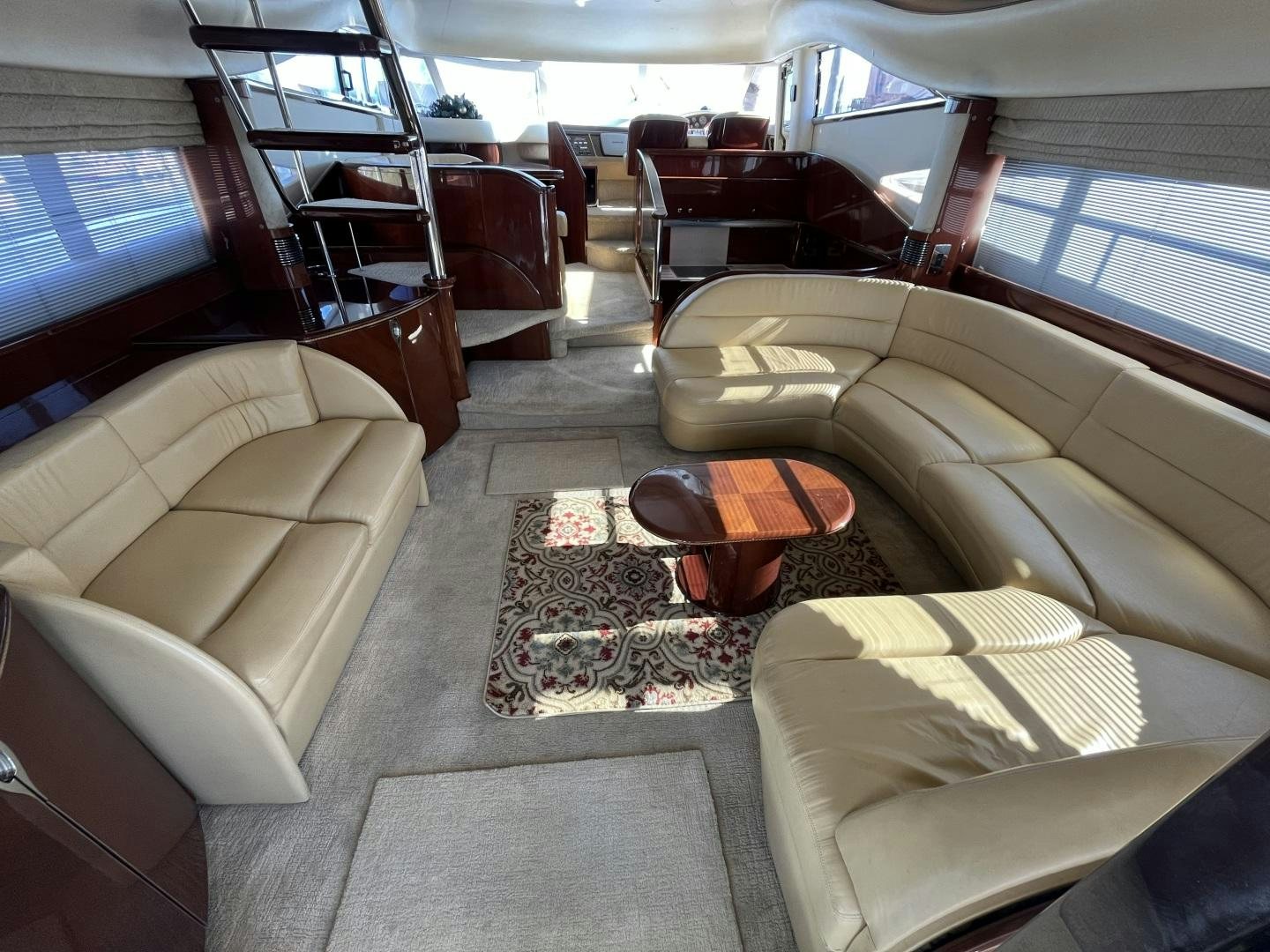 a room with a couch and a coffee table aboard SELAH WAY Yacht for Sale