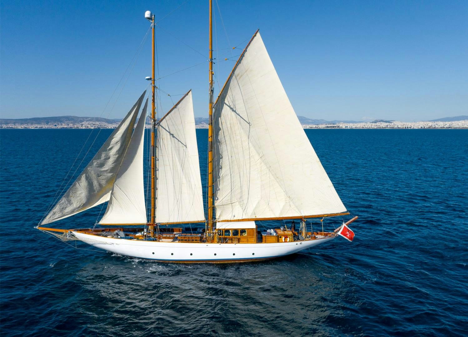 a sailboat on the water aboard WEATHERBIRD Yacht for Sale