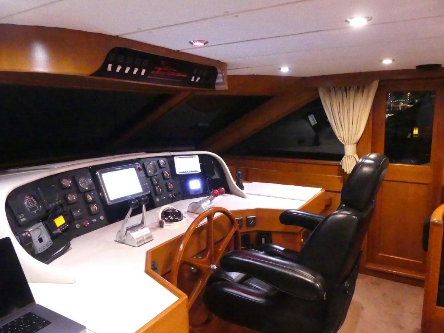 a room with a desk and computer aboard Applaus Yacht for Sale