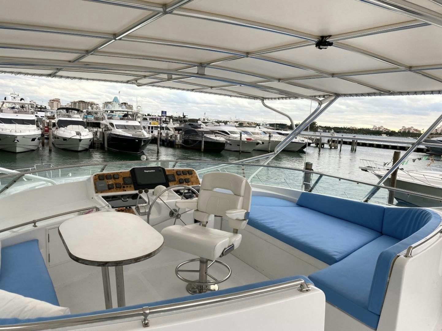 a boat with many chairs and tables aboard Applaus Yacht for Sale