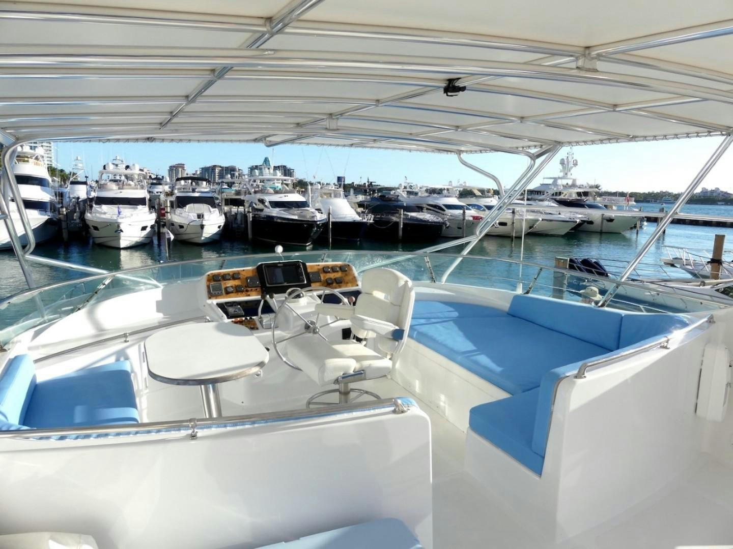a boat with many seats aboard Applaus Yacht for Sale