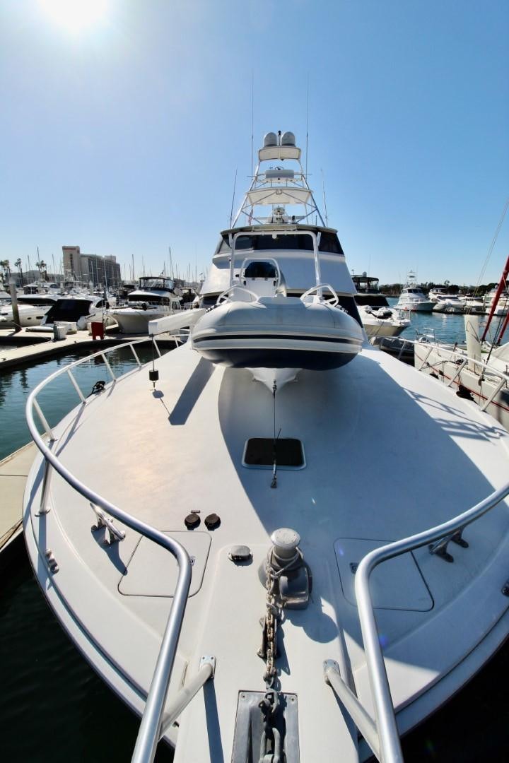 a boat in a harbor aboard BAD TO THE BONE Yacht for Sale