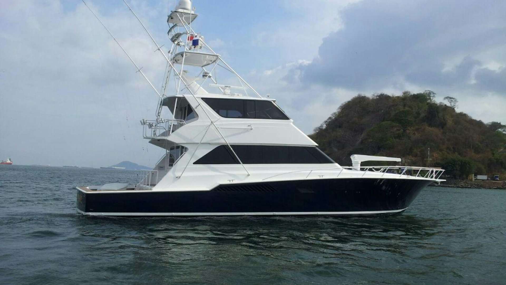 a boat in the water aboard BAD TO THE BONE Yacht for Sale