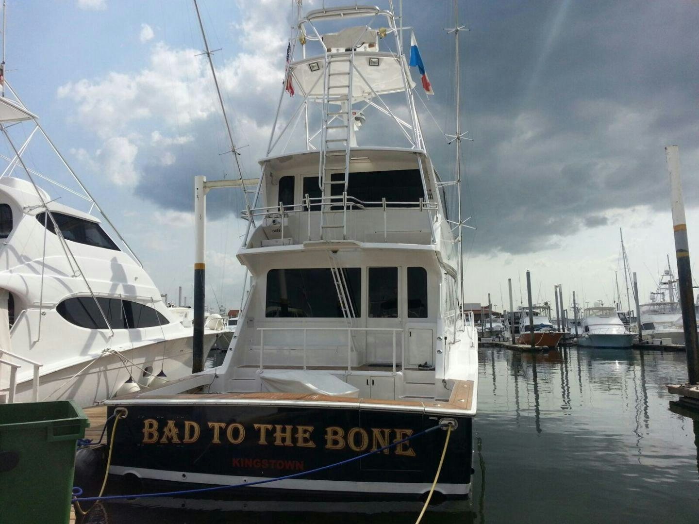 a group of boats are parked in a harbor aboard BAD TO THE BONE Yacht for Sale