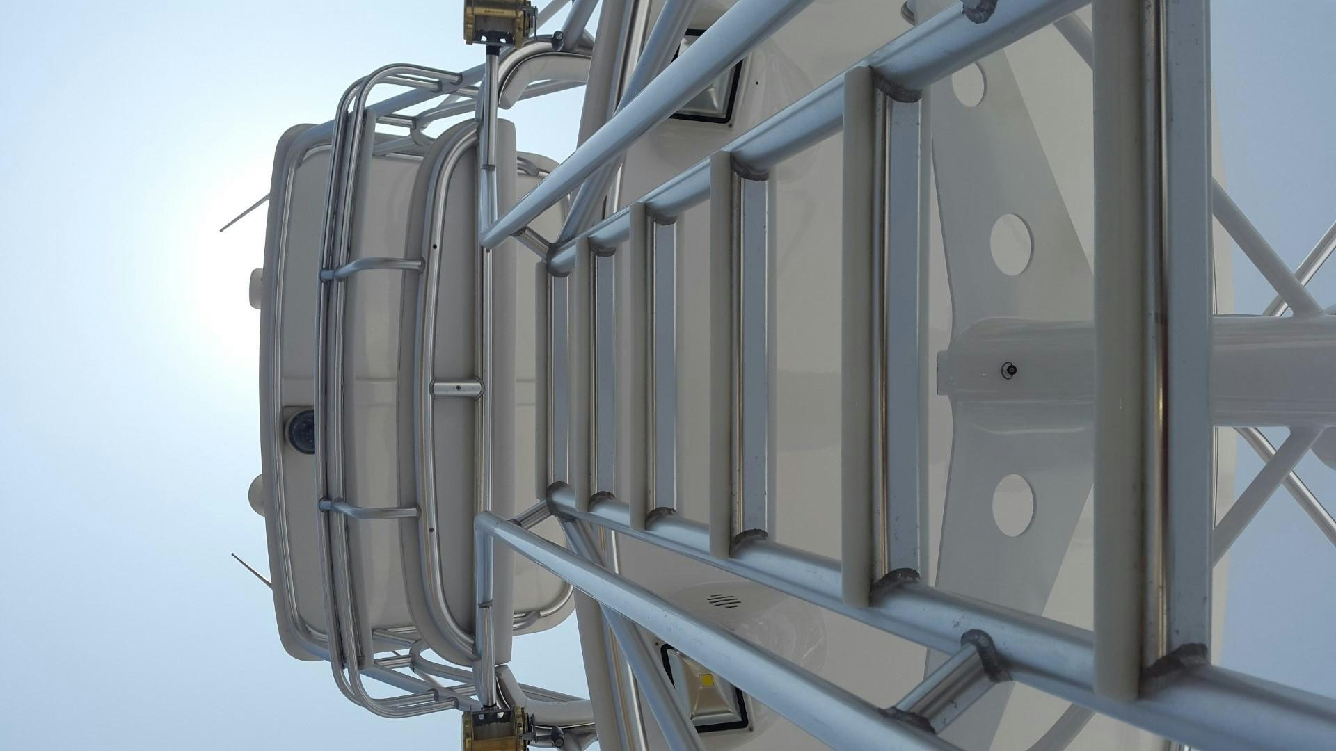 a close-up of a metal railing aboard BAD TO THE BONE Yacht for Sale