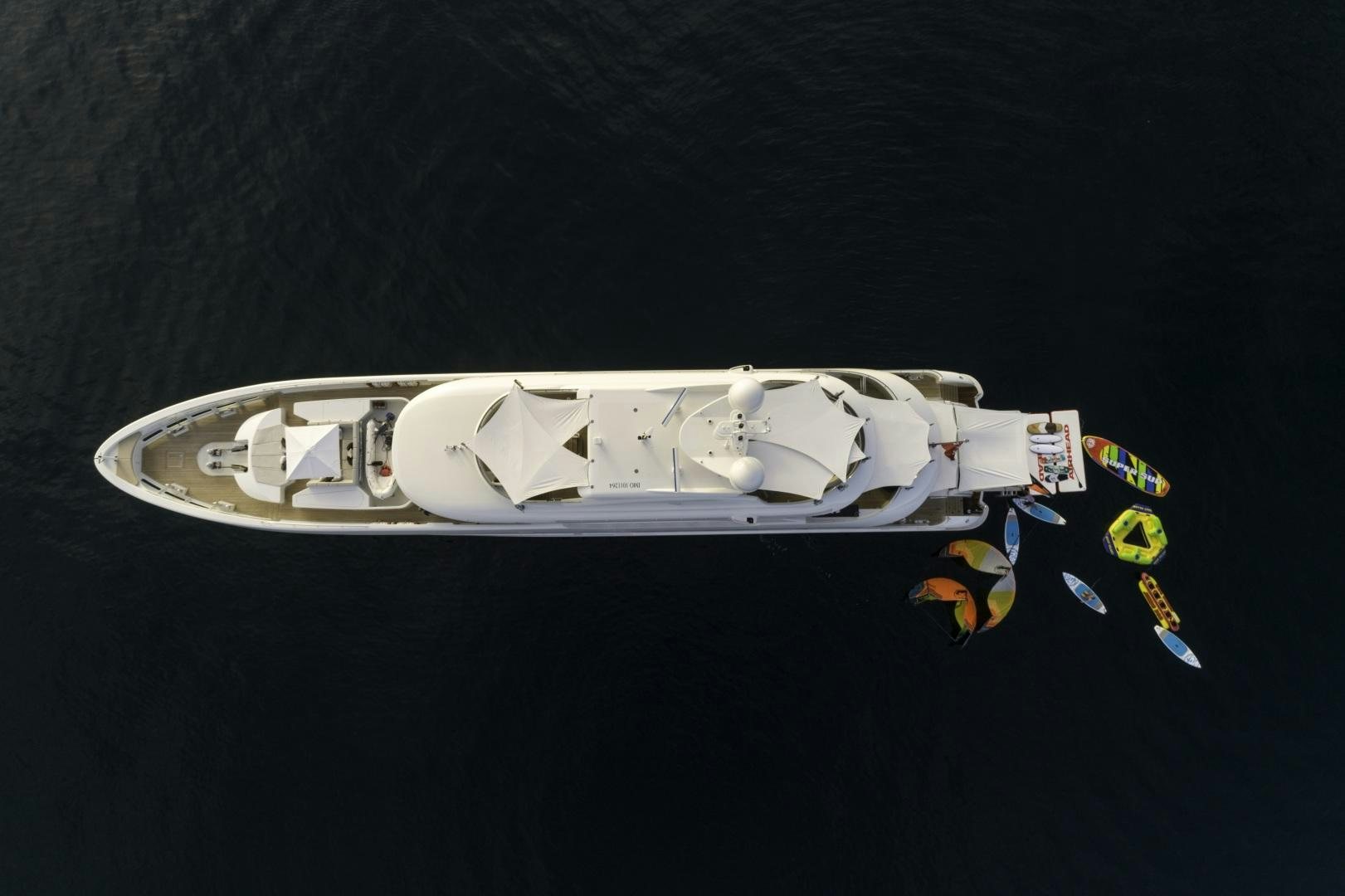 a white and yellow bracelet aboard ODYSSEA Yacht for Sale