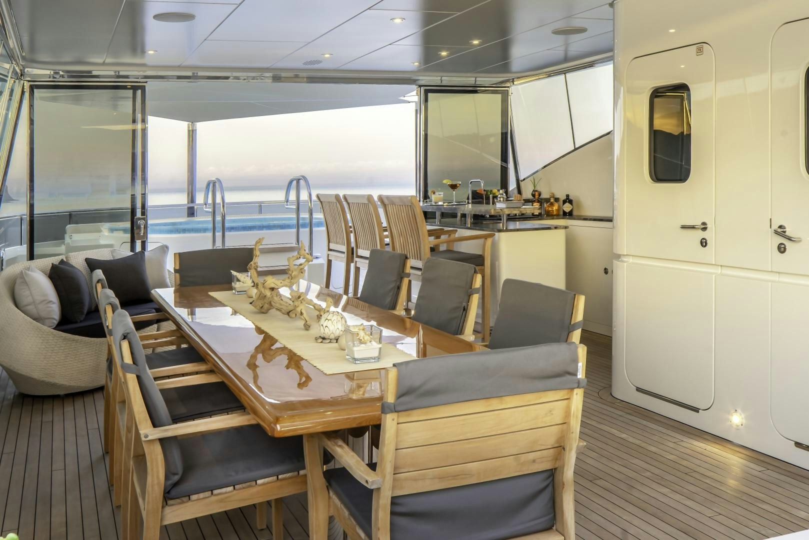 a dining table in a room aboard ODYSSEA Yacht for Charter