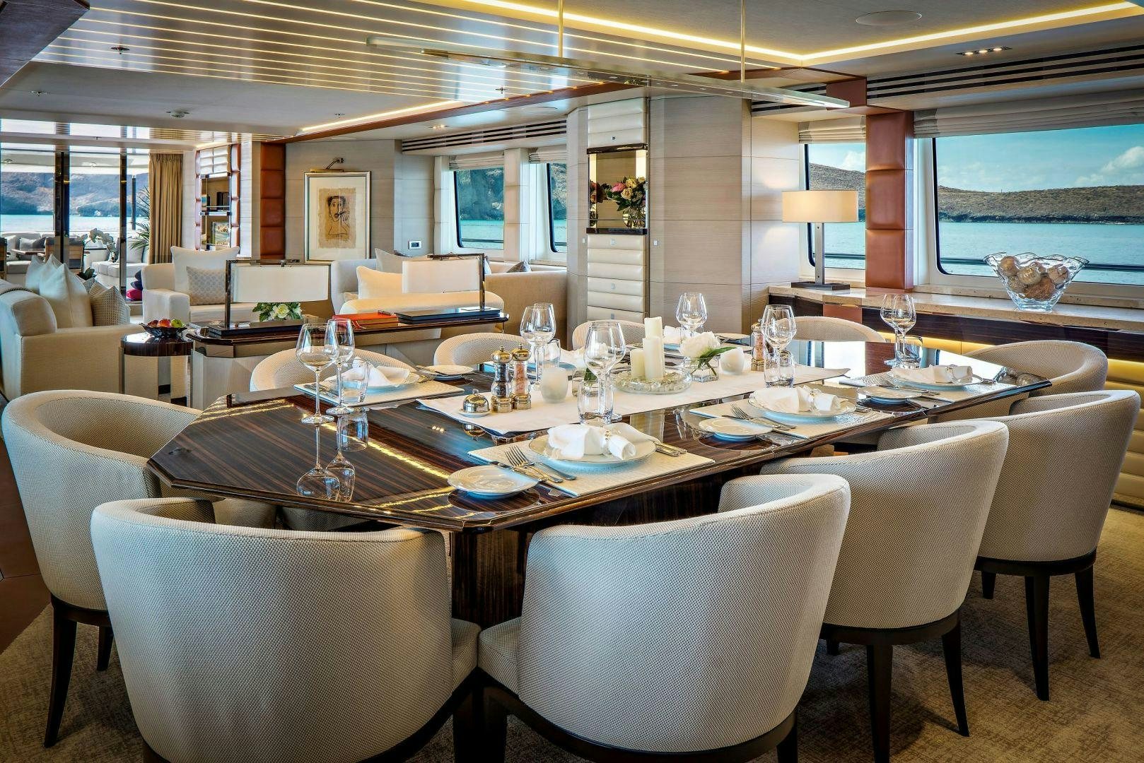a table set for a dinner aboard ODYSSEA Yacht for Charter