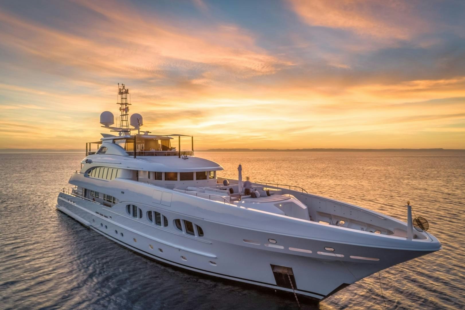 a white yacht on the water aboard ODYSSEA Yacht for Charter