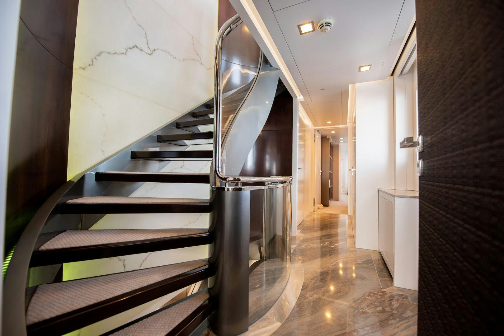 a staircase in a building aboard OCEAN'S SEVEN Yacht for Sale