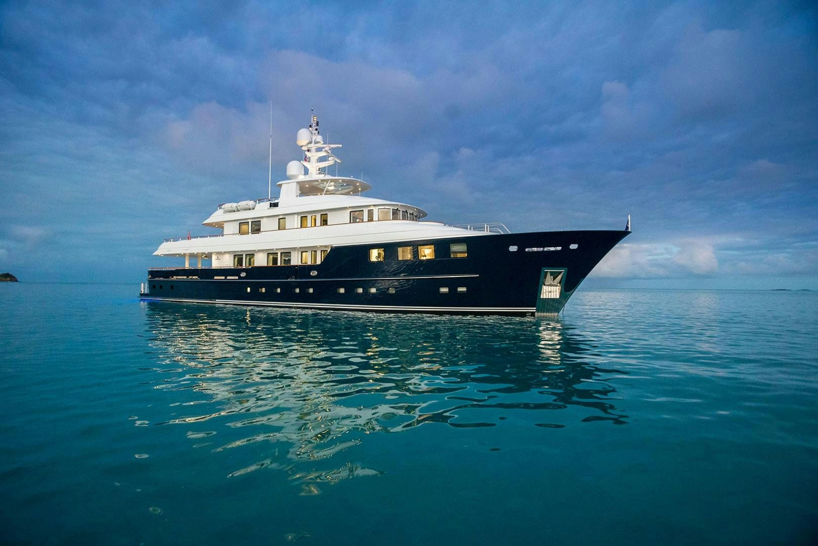 a large boat in the water aboard OCEAN'S SEVEN Yacht for Sale