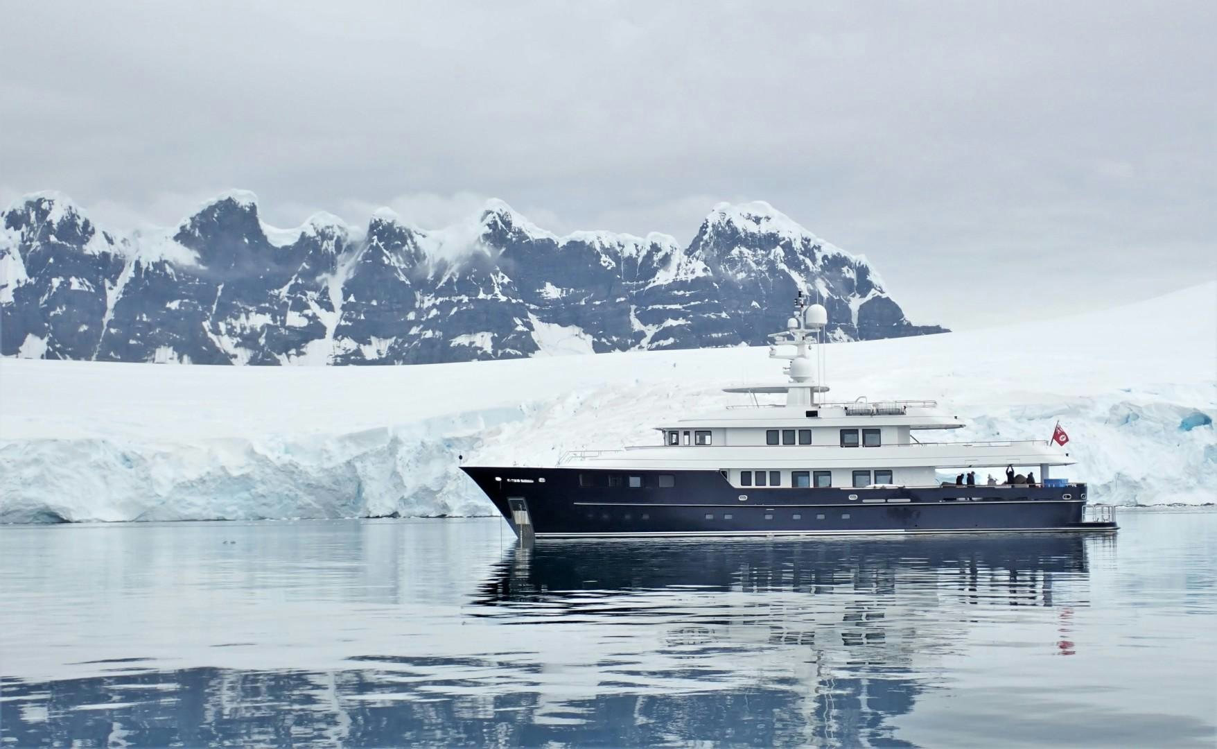 a large ship in the water aboard OCEAN'S SEVEN Yacht for Sale