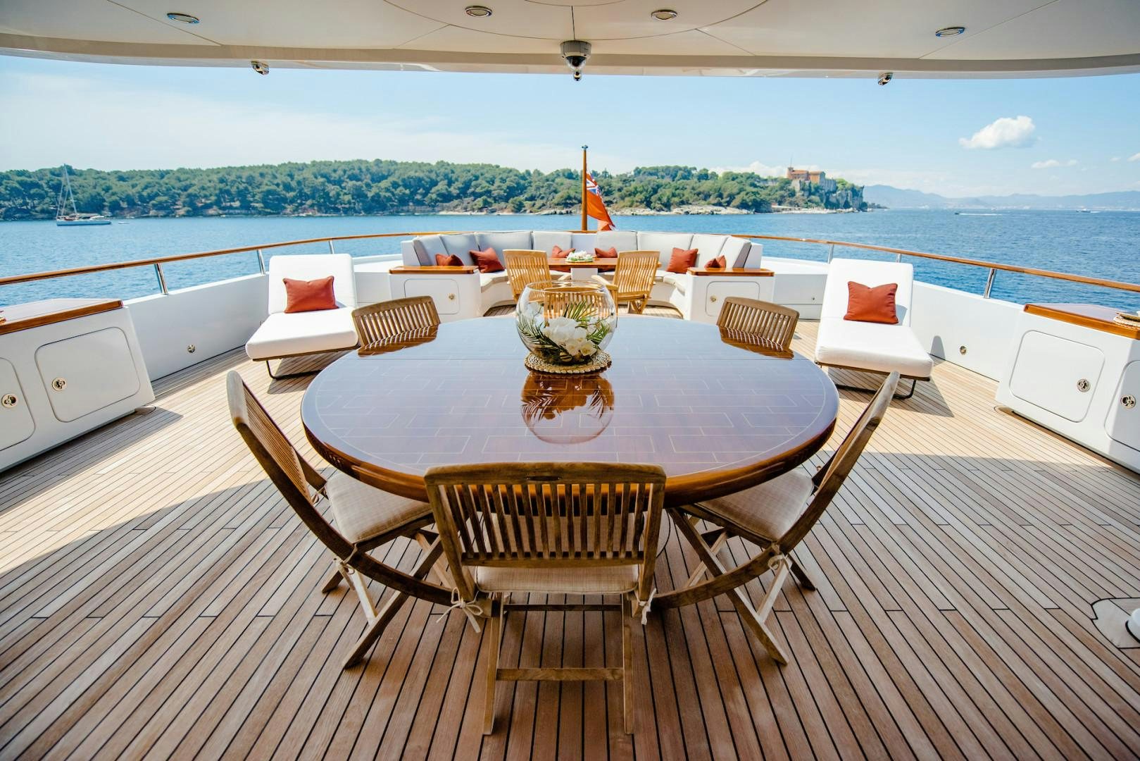 a table with chairs around it aboard OCEAN'S SEVEN Yacht for Sale