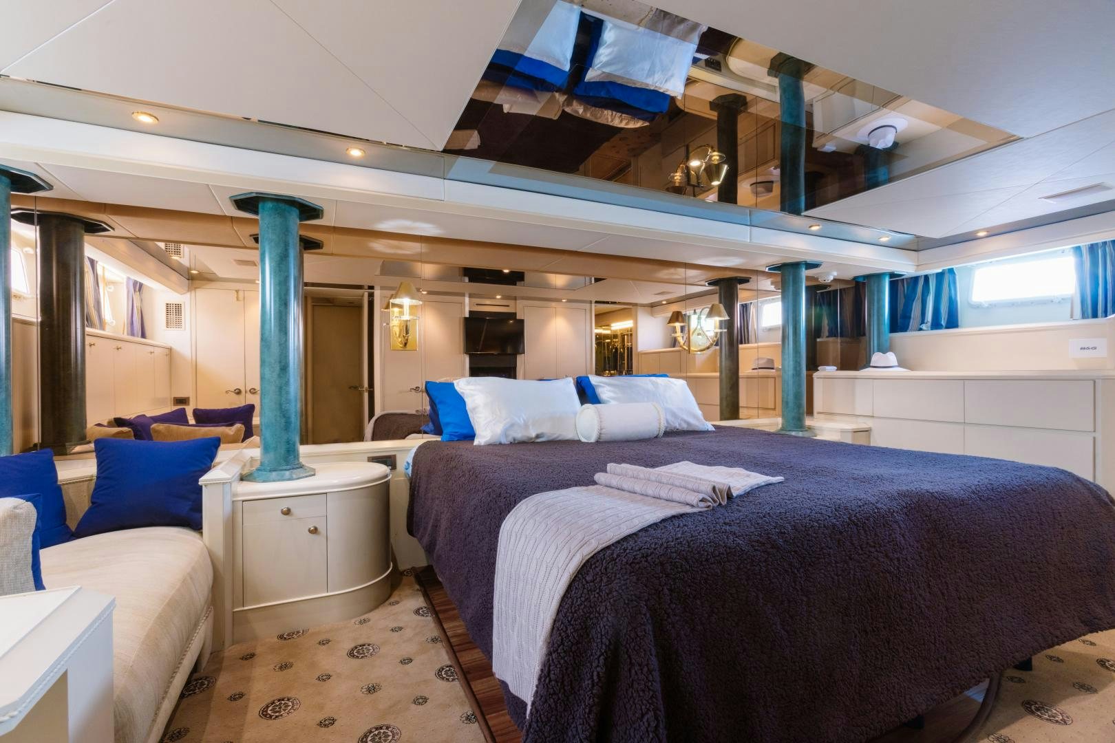 a room with a couple of beds aboard LORI LYNN Yacht for Sale