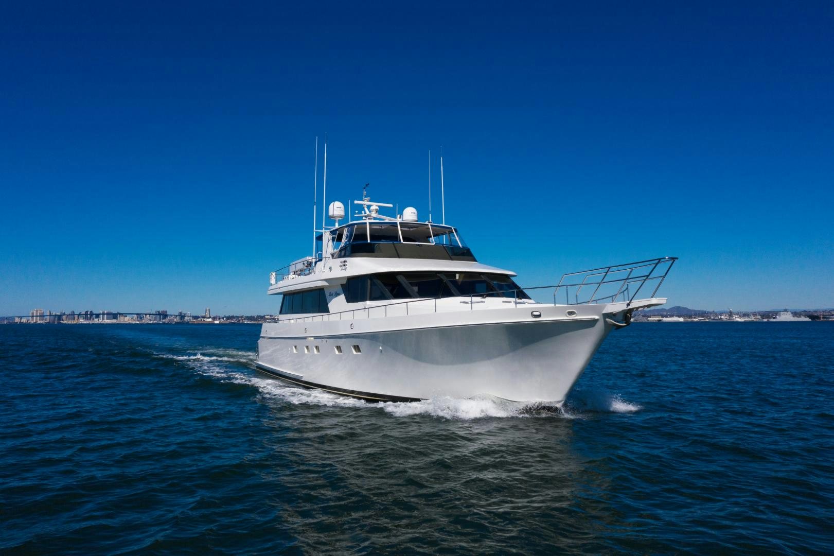 a white boat on the water aboard LORI LYNN Yacht for Sale